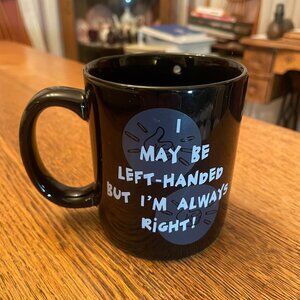 Humorous Left Handed Spill Coffee Cup Mug by Leftyslefthanded